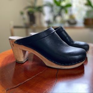 Black leather clogs